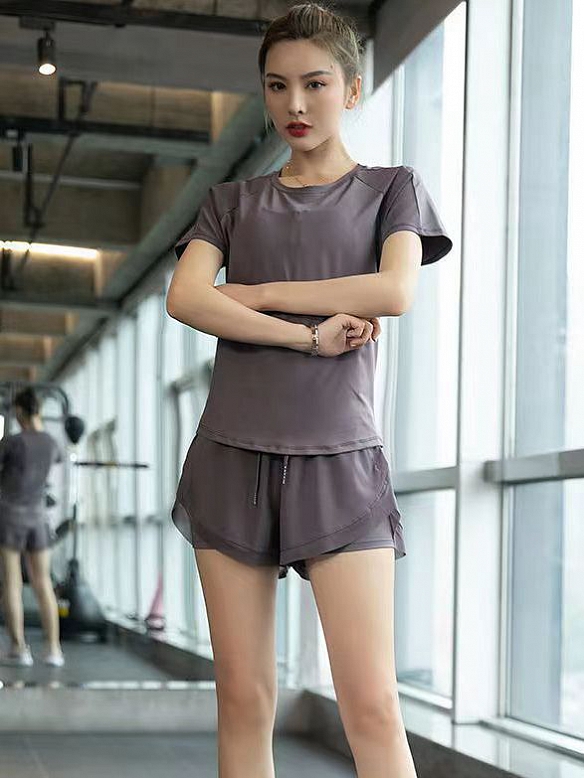 Locker sitzende, schlank laufende und schnell trocknende Fitnesskleidung  ST214